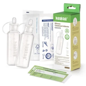 Haakaa colostrum opvangset met twee siliconen collectors van 4 ml, een katoenen doekje en een doorzichtig bewaardoosje.